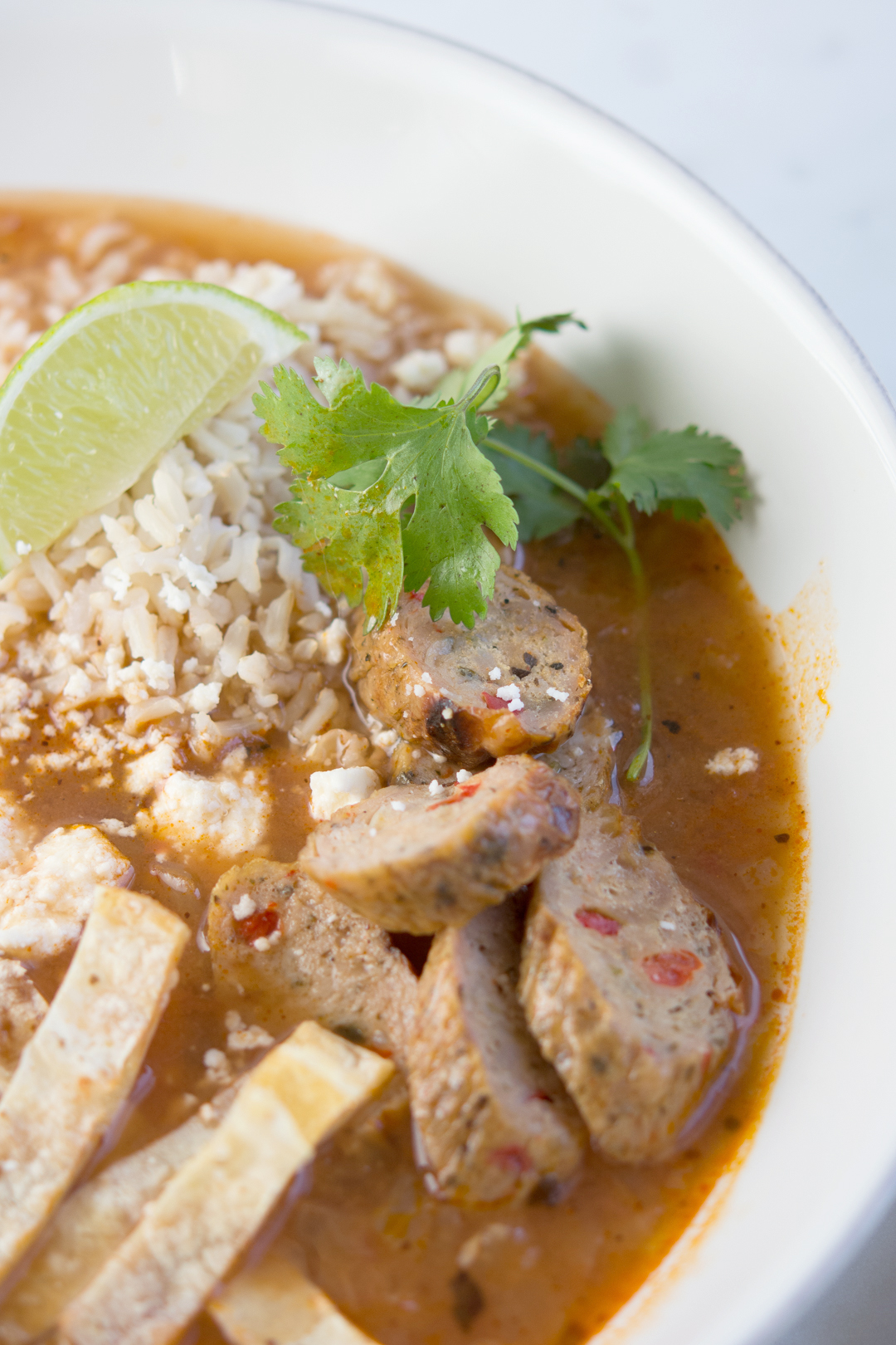 close up of tortilla soup in a bowl