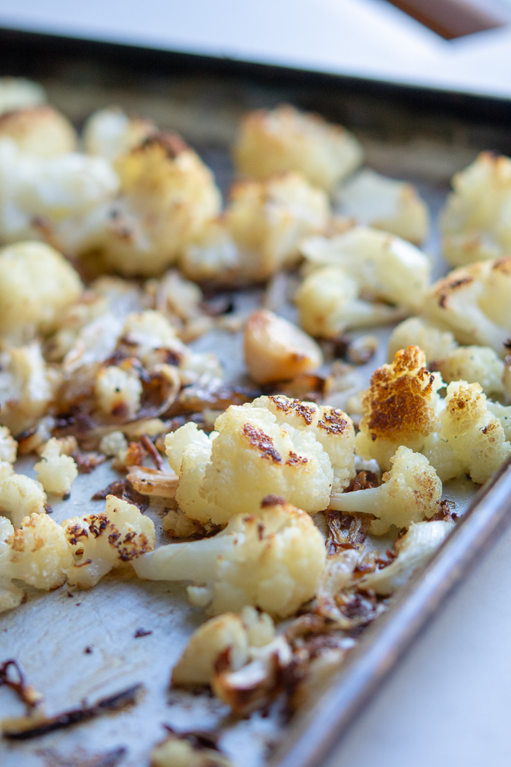 photo of roasted califlower in a sheet pan