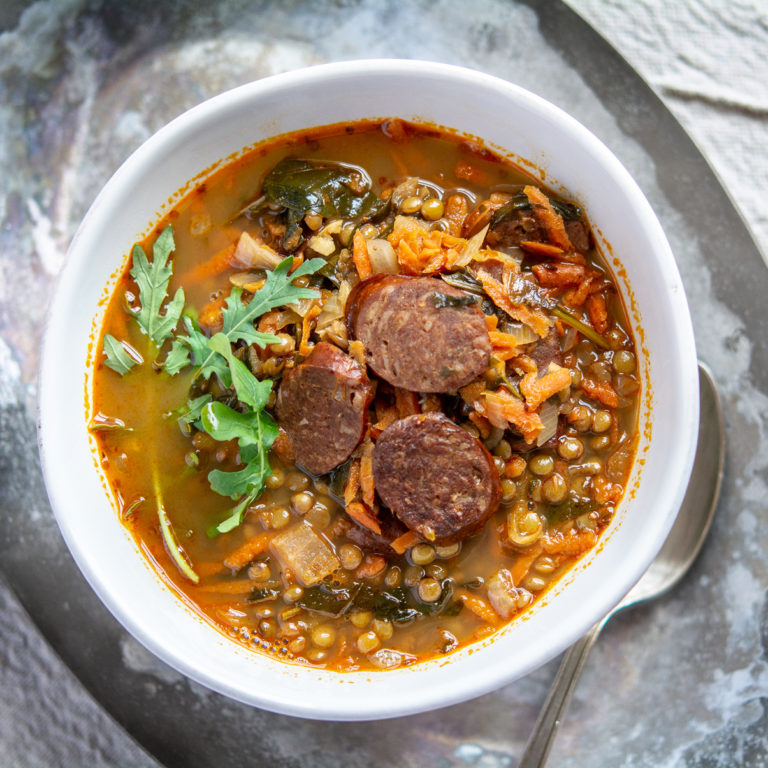 Photo from above of lentil and chorizo soup