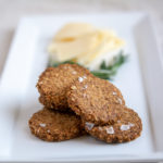 photo of rosemary oat crackers on a white platter