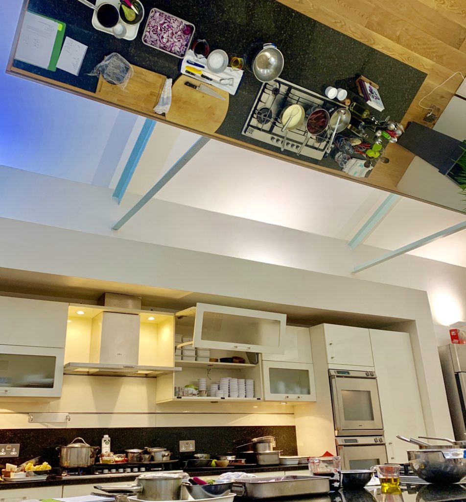 photo of demo kitchen and mirror above