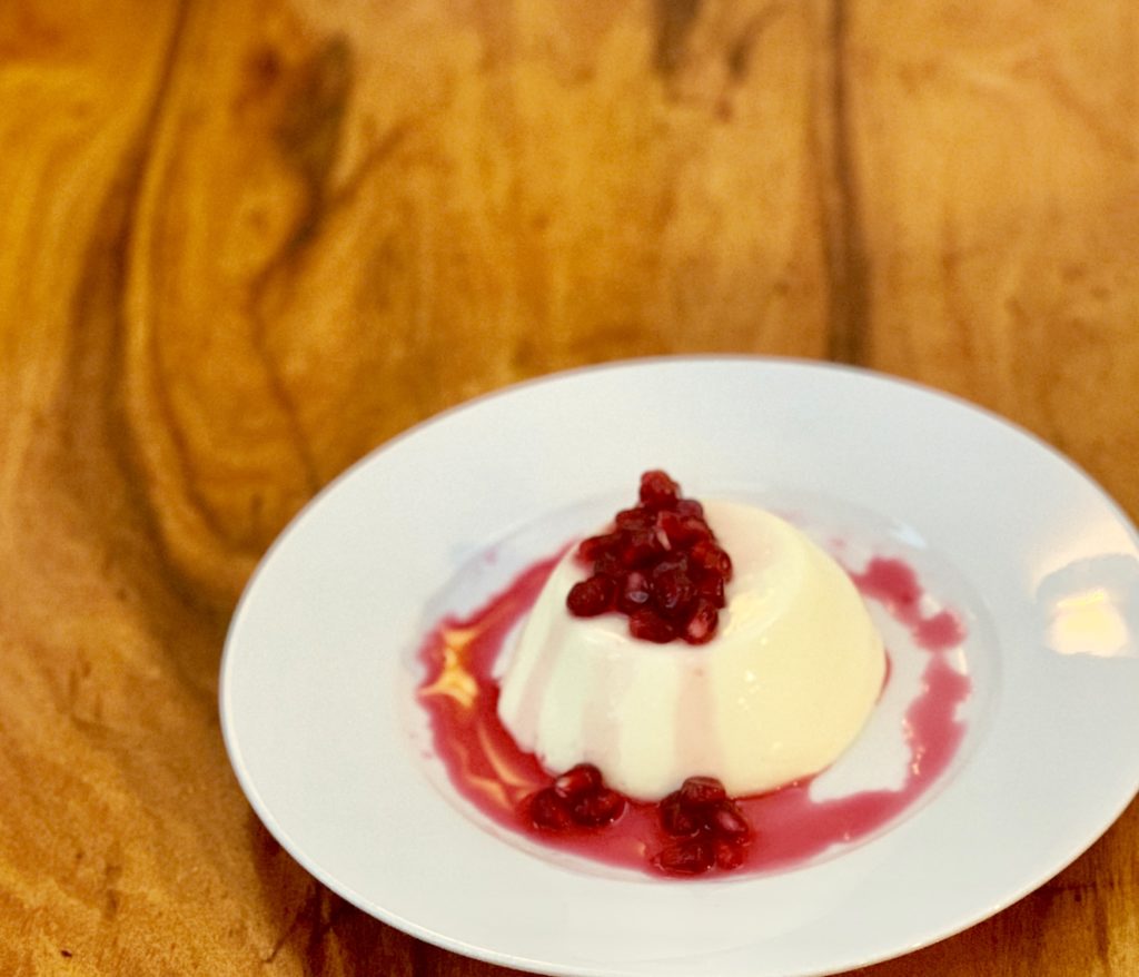 photo of cardamon set yogurt with pomegranate sweets