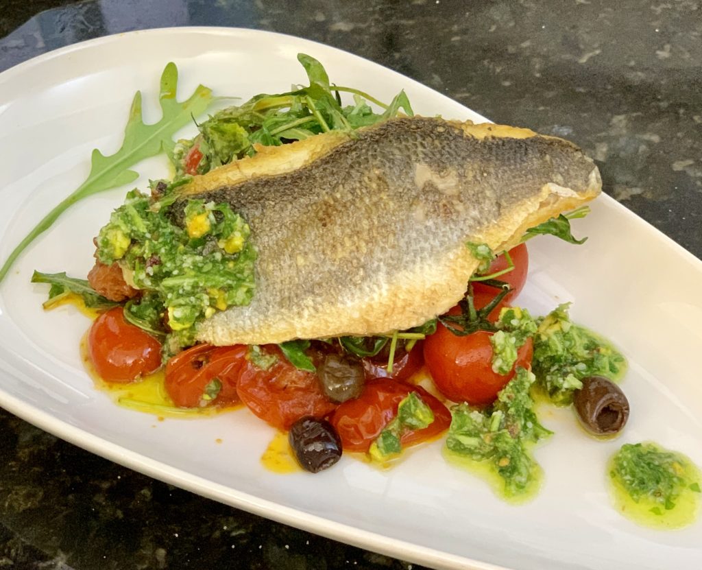 photo of filleted fish and tomatoes