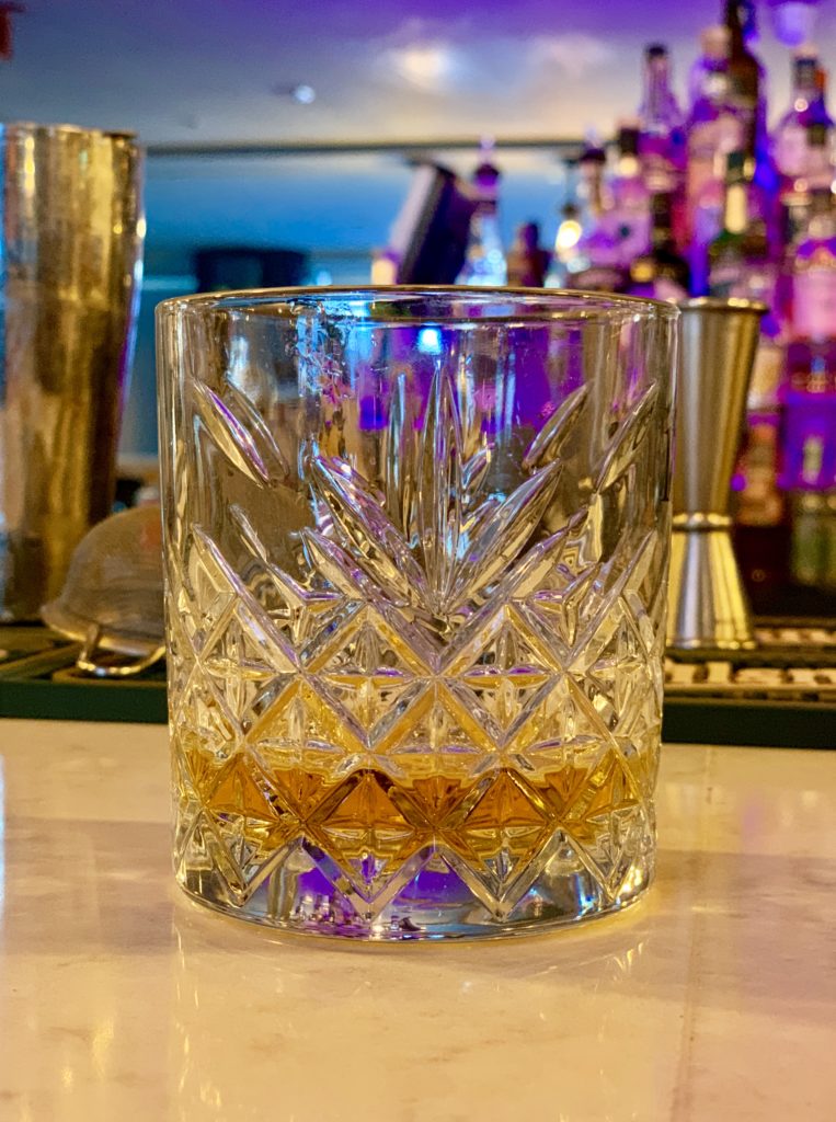 photo of a glass of greenspot whiskey