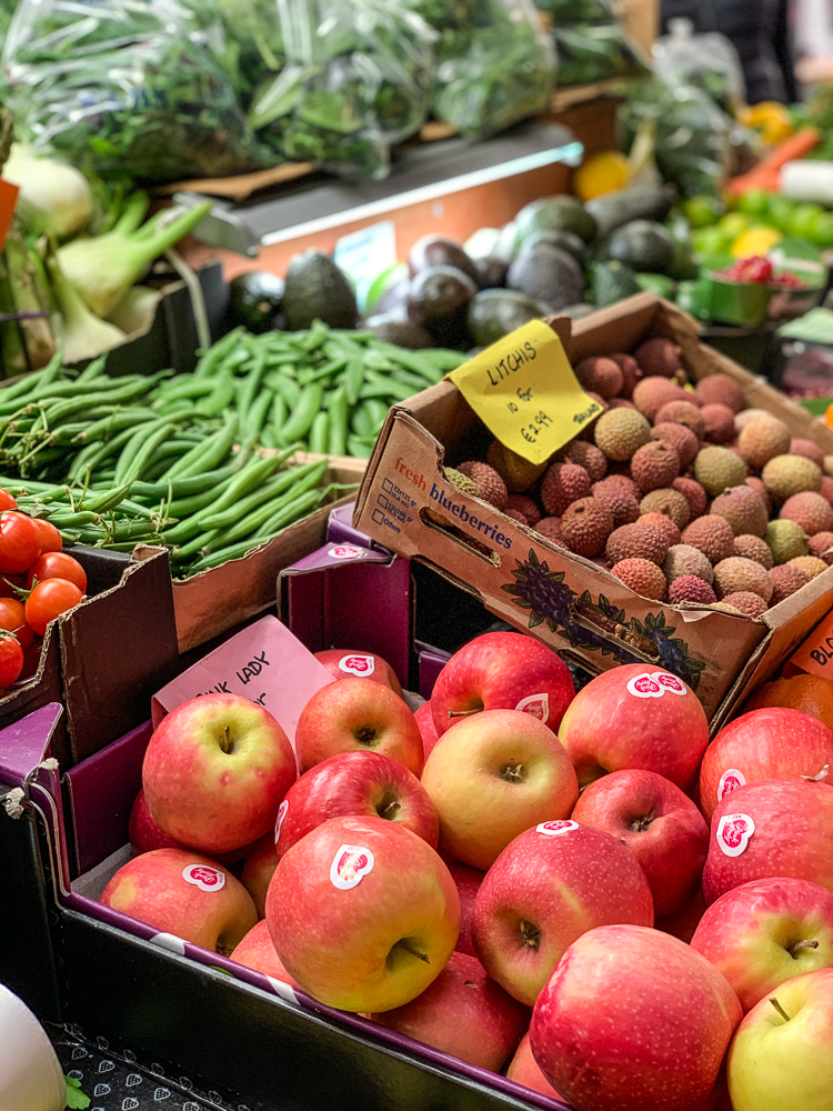 produce (apples, beans, litchi fruit) at English market