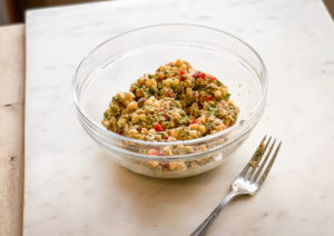 photo of corn zucchini fritters in a glass bowl