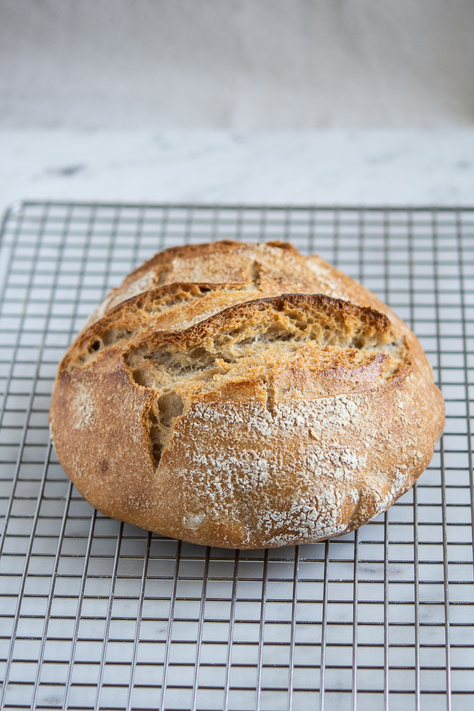 photo of sourdough bread on cooling rack