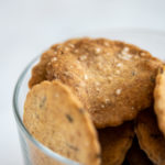 closeup of Rustic sourdough crackers in a glass