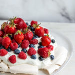 cropped view of berry pavlova