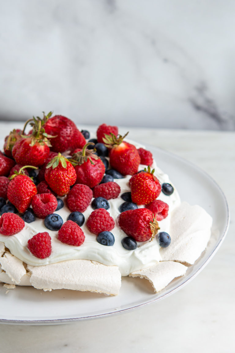 cropped view of berry pavlova