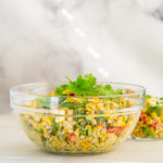 Large glass bowl of Grilled Elote Corn Salad