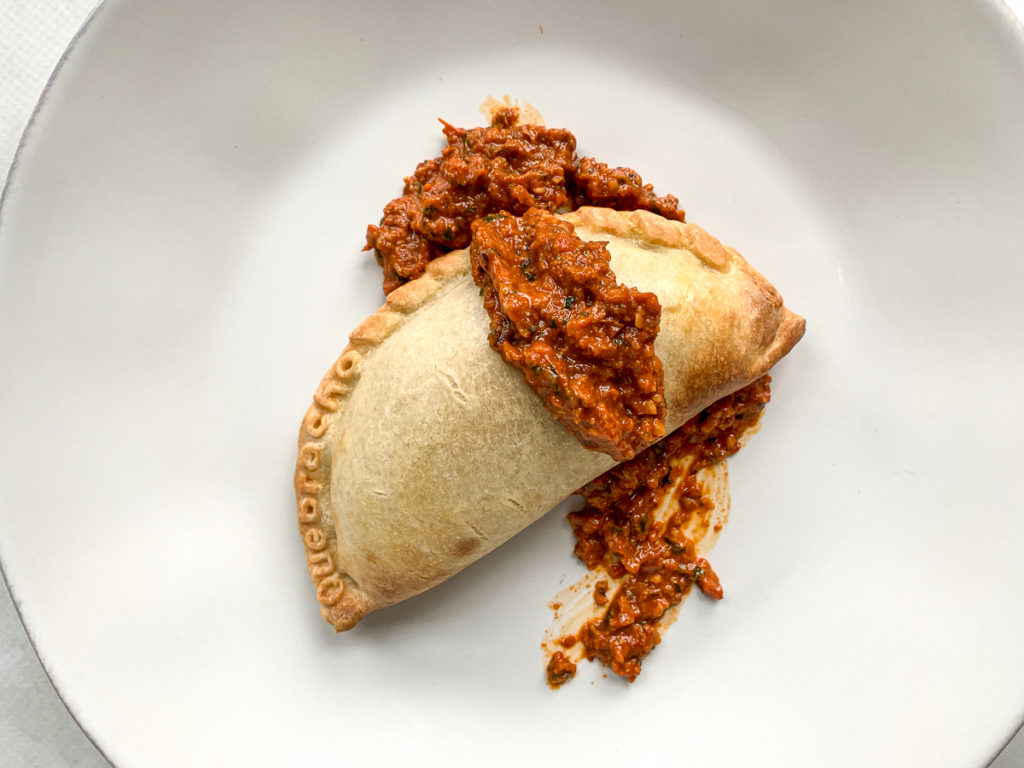 Roasted Romesco Sauce on a Quebracho empanada