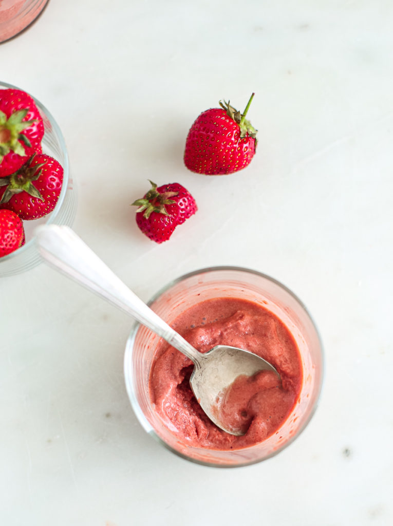 overhead shot of strawberry bang and strawberries