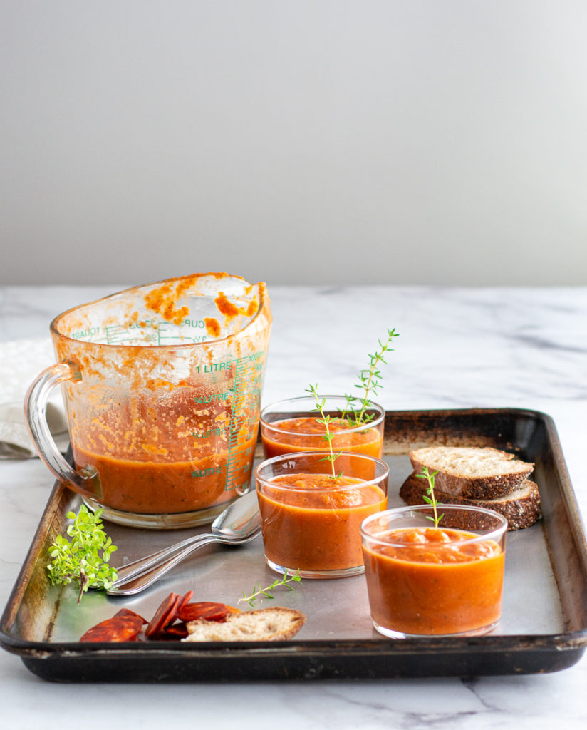 Casual Grilled Gazpacho in a measuring cup ready to serve