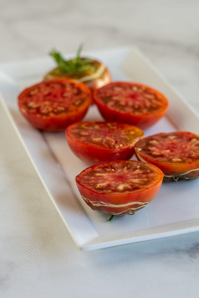 cut tomatoes for Grilled Gazpacho