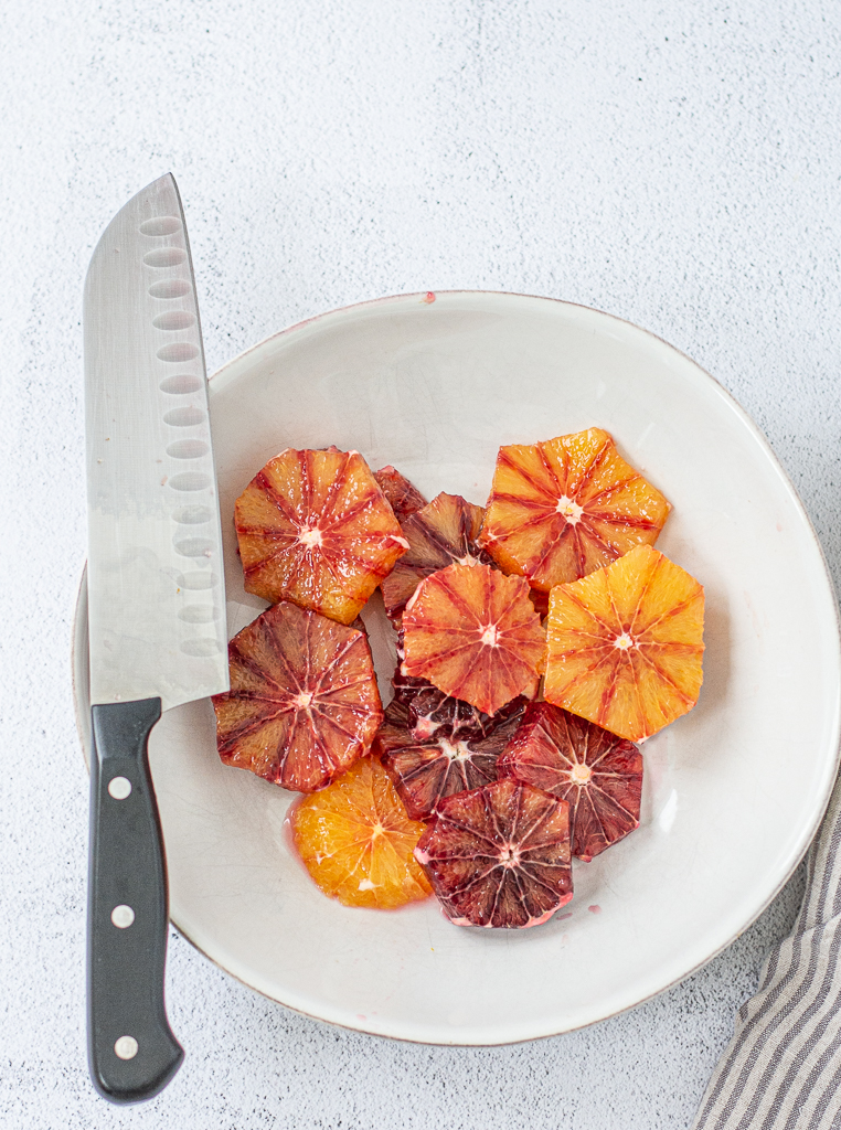 photo of sliced blood oranges in a bowl