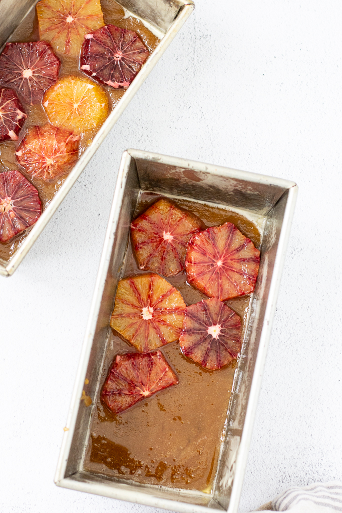 overhead shot of oranges in loaf tins