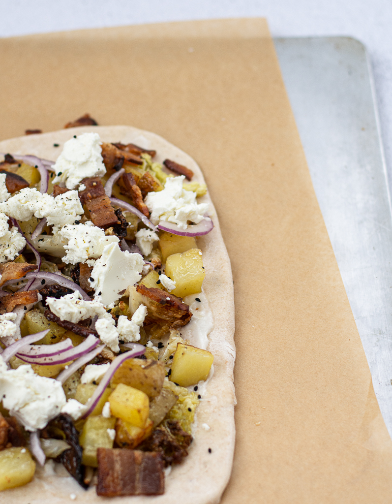 close up overhead shot of unbaked Shelagh's Irish Pizza