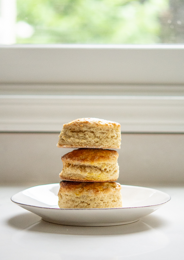 three irish scones stacked on a plate