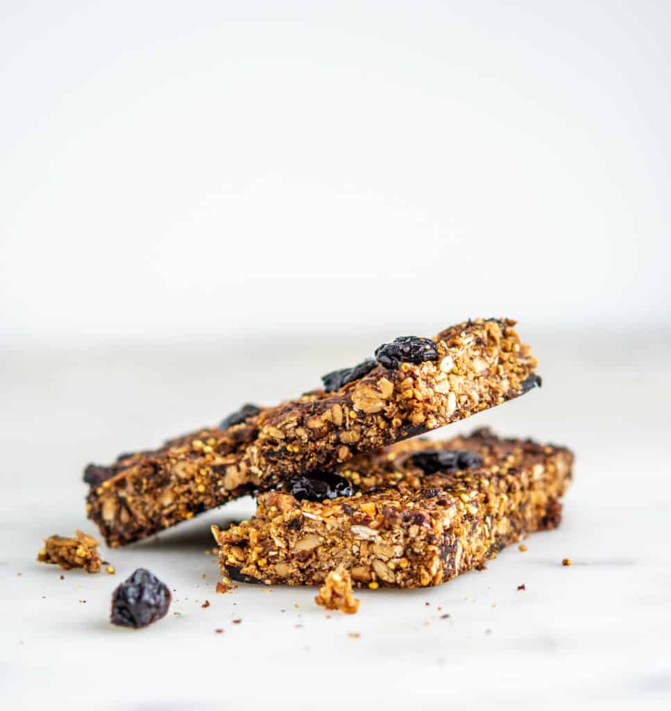 granola bars stacked with crumbles