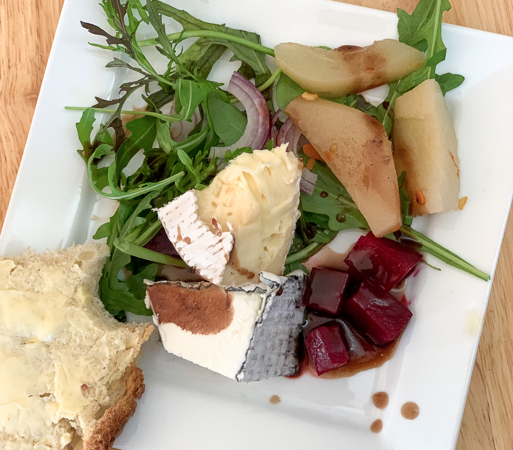 Salad of goat cheese, greens, poached pears and irish soda bread