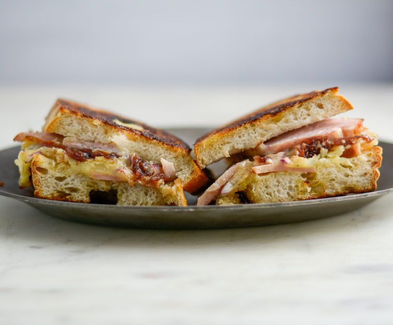 photo of cheese toastie on an aluminum plate