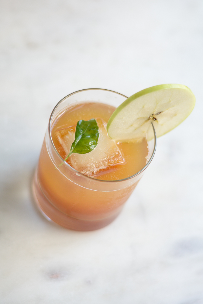 overhead shot of mullen tea in a low ball glass