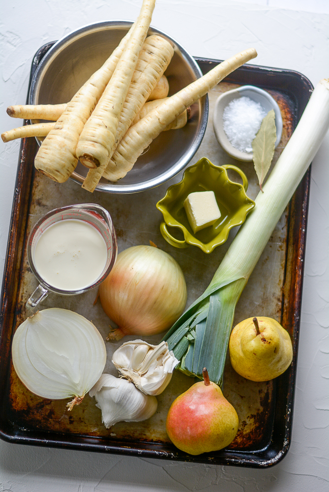 Roasted Parsnip and Pear Soup overhead shot of ingredients on a sheet pan