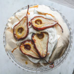 Overhead shot of Roasted Pear Pavlova on a pretty cake plate