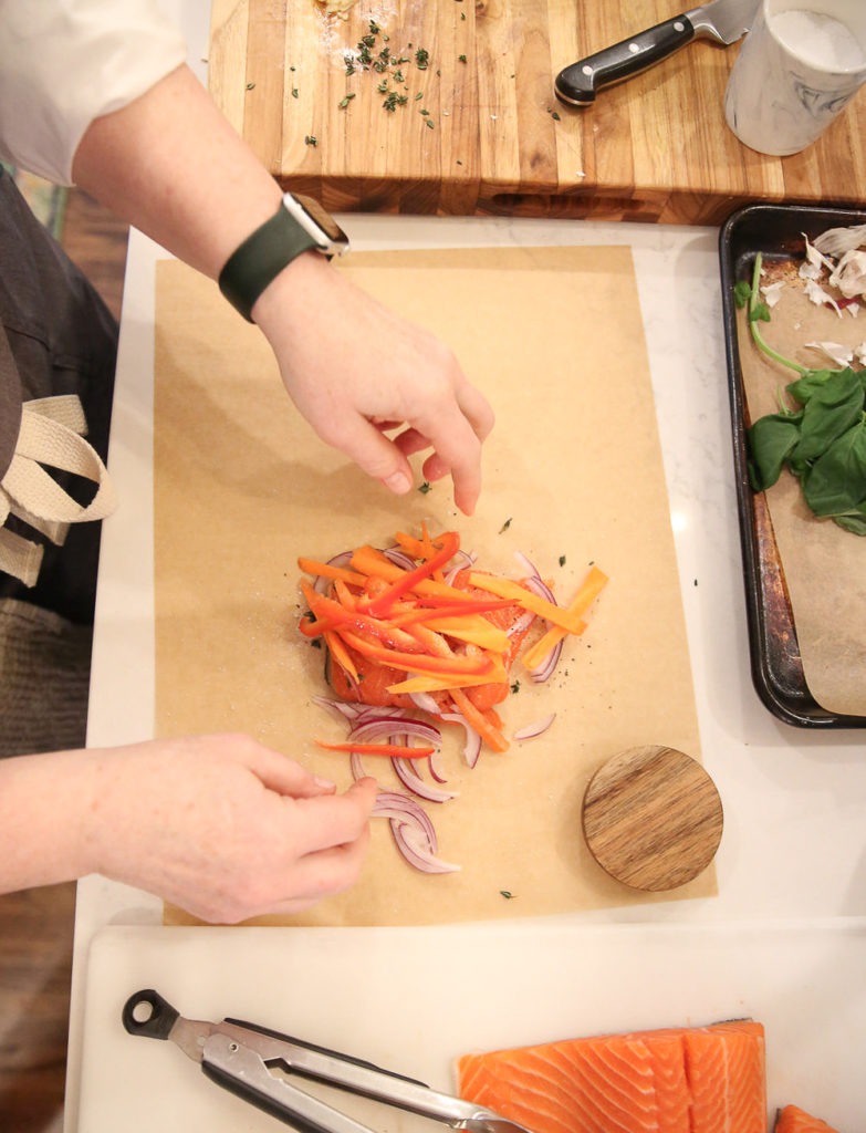 overhead shot making salmon packets