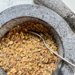 Dukkah in a mortar and pestle