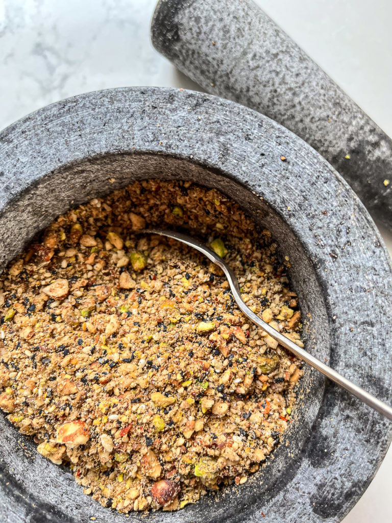 Dukkah in a mortar and pestle