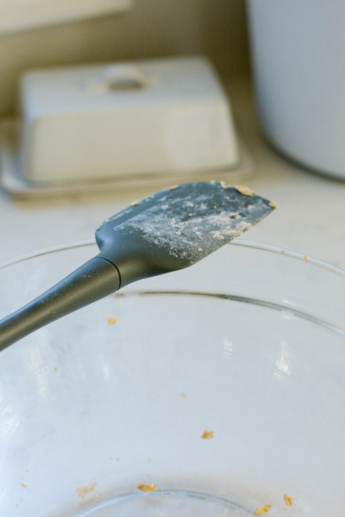 empty glass bowl and rubber spatula