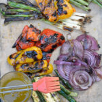 Grill veg on a sheet pan for Charred Garden Vegetables with Herb Dressing recipe