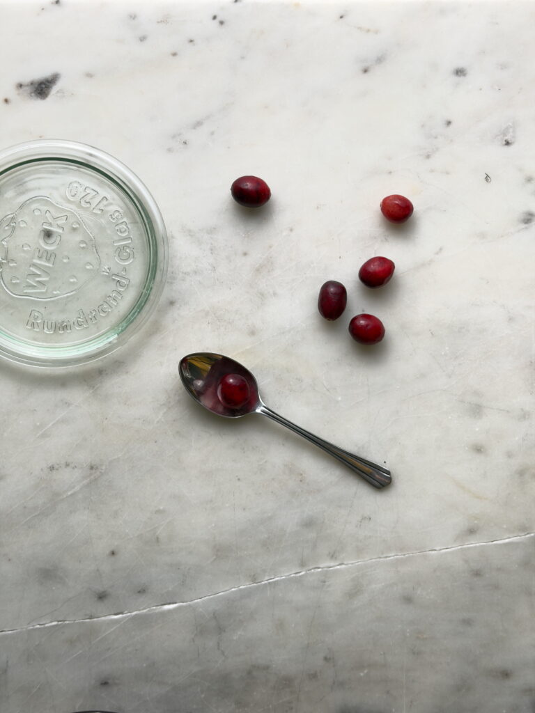Cranberries on a spooon