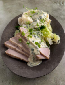 Bacon and cabbage on a metal tray