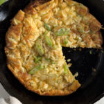 Overhead shot in cast iron pan of Savory Dutch Popover